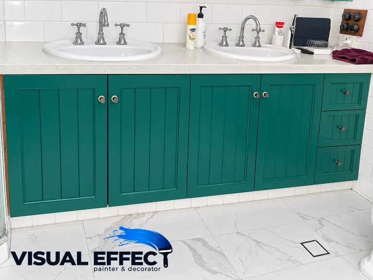 Bathroom vanity cabinets repainted deep green by Visual Effect in Perth