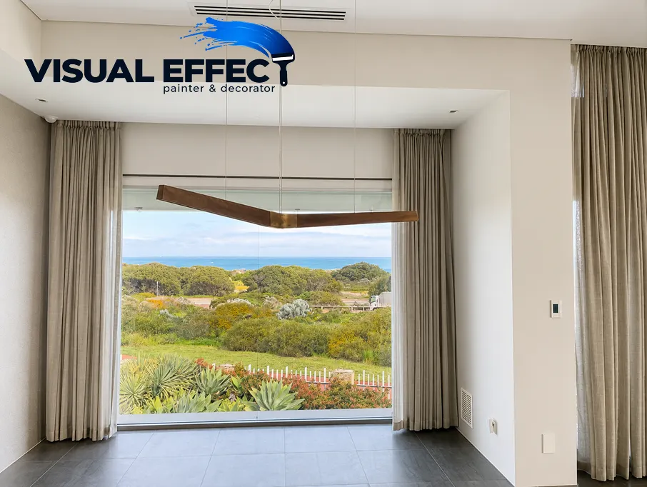 Freshly painted living room with ocean views in Perth by Visual Effect